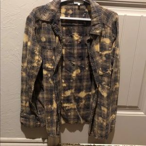 Distressed buckle plaid shirt